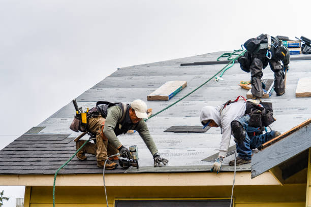Professional Roofing technician working in North Highlands, CA